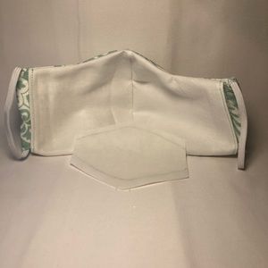 Handmade mask with pocket.